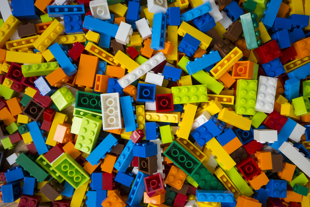 Close-up of a cluttered pile of colourful Lego bricks. Did you know you can sell old lego by the kilo to make extra money?
