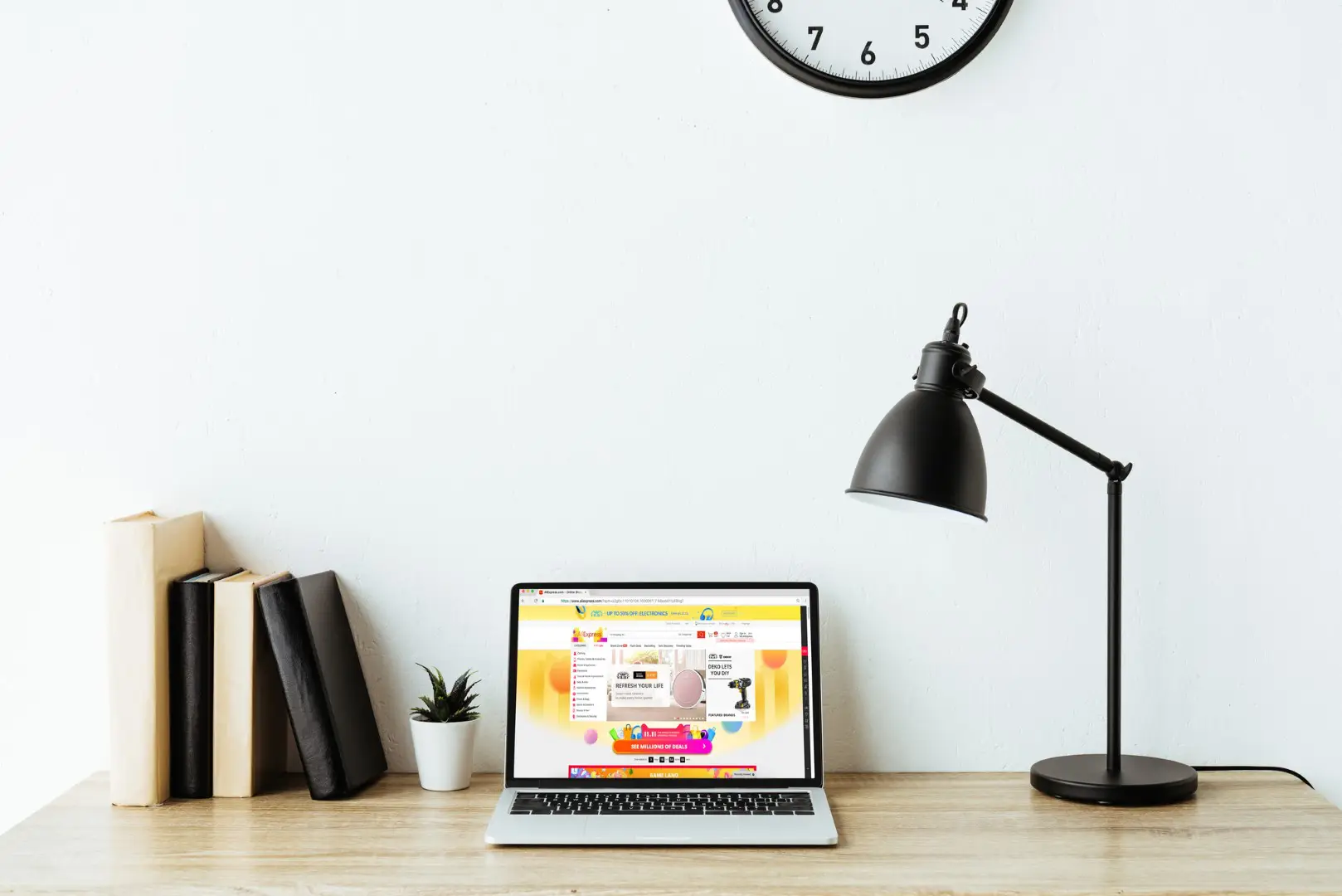 a laptop and books