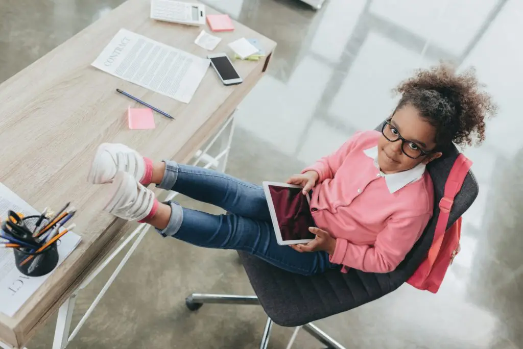 a girl working on her tablet