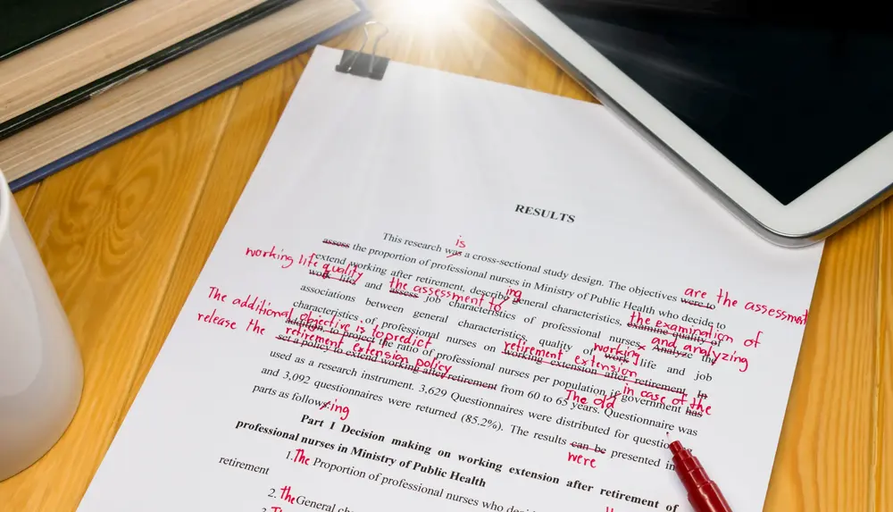 An essay marked with red pen. Proofreading is a good way to earn extra money, and you don't need particular qualifications.